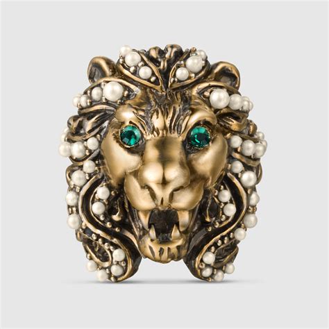 gucci ring silver 4 lion heads|used Gucci lion ring.